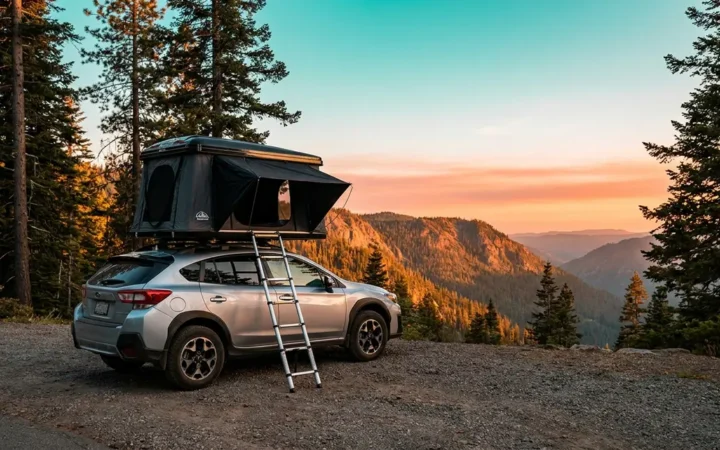 Best rooftop tent for Subaru Crosstrek mounted on silver Crosstrek at forest overlook